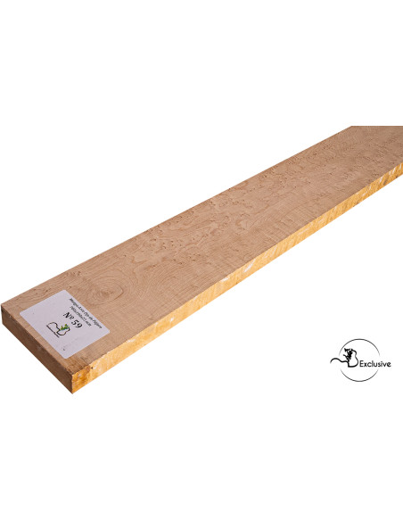 Detalle de la figura natural del arce ojo de pájaro en mango MB Exclusive para guitarra eléctrica