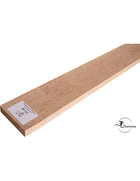 Detalle de la figura natural del arce ojo de pájaro en mango MB Exclusive para guitarra eléctrica