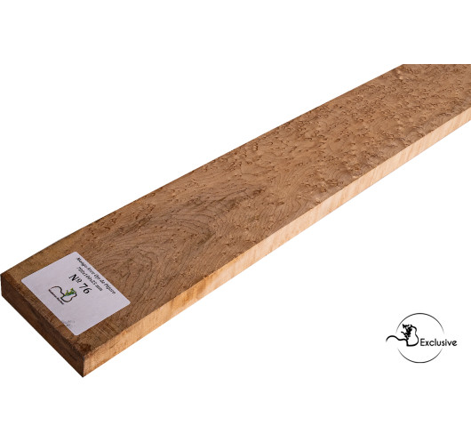 Detalle de la figura natural del arce ojo de pájaro en mango MB Exclusive para guitarra eléctrica